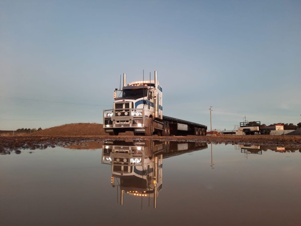 Kenworth Truck flat top trailer for freight haulage in Orange